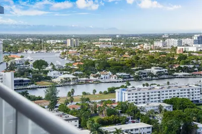 a view of a city with a river and buildings at 2BR W Resort, Birds eye view of it all, Professionally Designed in Fort Lauderdale