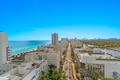 an aerial view of a city with the ocean at Fontainebleau Hotel Junior Suite in Miami Beach