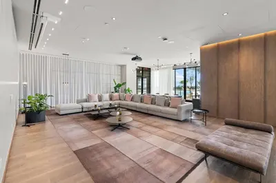 a living room with a couch and a table at NEW 28th Floor unit - Breathtaking Bay and Downtown Views in Miami