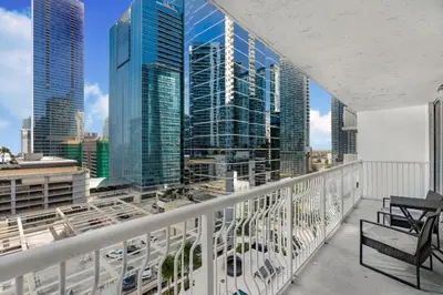 a balcony with a view of a city skyline at Stylish Brickell Condo with Stunning Views & Premier Amenities in Miami