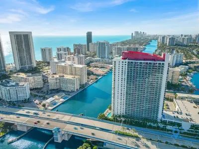 an aerial view of a city with buildings and a bridge at Amazing Studio Near the Beach in Hallandale Beach