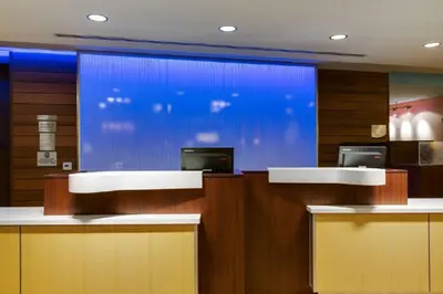 a lobby with a large blue screen in a hospital at Fairfield Inn & Suites by Marriott Fort Lauderdale Pembroke Pines in Pembroke Pines
