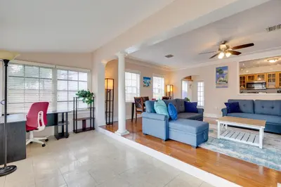 a living room with a couch and a table at House with Shared Pool Access 4 Mi to Beaches! in Fort Lauderdale