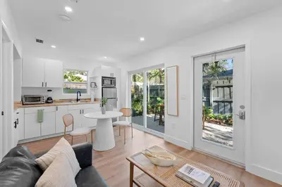 a kitchen and living room with a couch and a table at 921 Apartment 3 in Fort Lauderdale