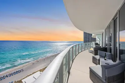 a view of the beach from the balcony of a hotel at Ventur Beachfront Luxe Condo - Lyfe Beach Resort in Hollywood