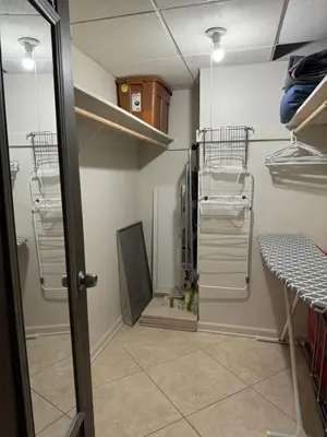 a room with a walk in closet with shelves at Spectacular ocean view 1 bedroom in Hollywood in Hollywood