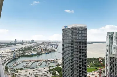 a view of a city and a river from a skyscraper at NEW Luxury Bay View Downtown Studio in Miami