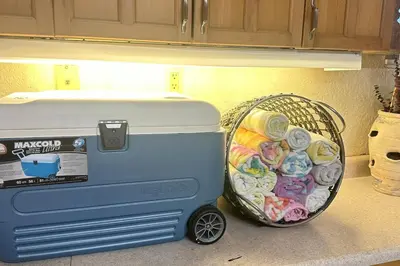 a toy stove sitting next to a basket of cookies at Cozy studio in Hollywood, FL in Hollywood