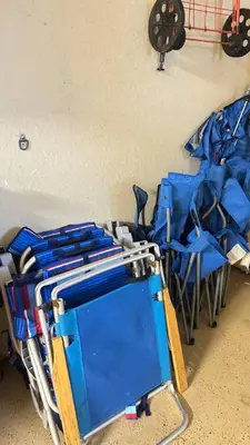 a group of blue chairs in a room at Cozy studio in Hollywood, FL in Hollywood