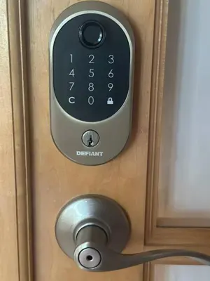 a close up of a door with a digital lock at 3-BR space in charming Hollywood in Hollywood