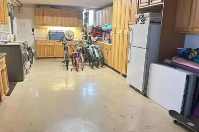 a kitchen with two bikes parked in a kitchen at 3-BR space in charming Hollywood in Hollywood