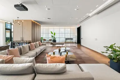 a large living room with couches and tables at Suite at downtown Miami residences - Great view 30th floor in Miami