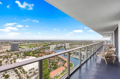 an expansive balcony with a view of a city at 42nd Floor Penthouse 3 BDR in Hyde Beach House in Hollywood