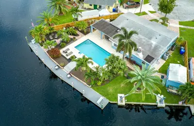 an aerial view of a house with a swimming pool at The Aqua Villa in Hollywood
