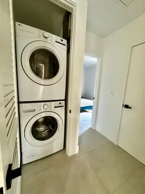 a white washer and dryer in a room at Miami Oasis by Brickell and Beaches in Miami