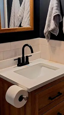 a bathroom with a sink and a mirror and towels at Luxury 3BR Duplex in Cutler Bay, Pool Table, BBQ, Terrace & Free Parking in Cutler Ridge