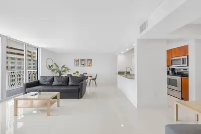 a living room with a couch and a table at Modern Brickell Condo with Prime City Views in Miami