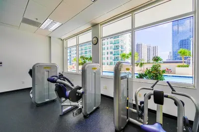 a gym with a view of a city at Modern Brickell Condo with Prime City Views in Miami