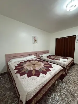 a room with two beds in a room at Hotel Rainbow - Miami - Little Havanna in Miami