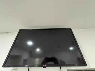 a flat screen tv sitting on top of a wall at Hotel Rainbow - Miami - Little Havanna in Miami
