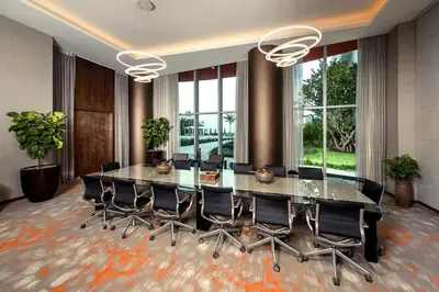 a conference room with a large glass table and chairs at Sun and Beach Closer of You! Condo All-In in Hollywood