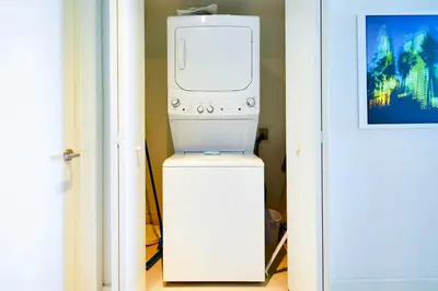 a machine sitting on top of a refrigerator in a room at Sun and Beach Closer of You! Condo All-In in Hollywood