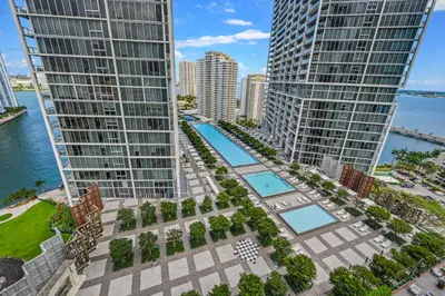 an aerial view of two tall buildings and a pool at Magnificent Unit with Priceless Views W Icon in Miami