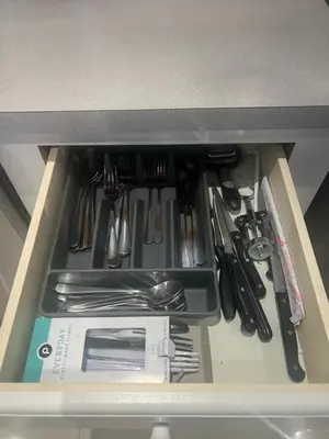 a drawer filled with lots of utensils at 1 SPRING PROMO - Sunny Isles Seaview Condo, Walk to Beach, Amazing Amenities in Sunny Isles Beach