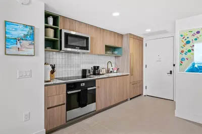 a kitchen with a sink and a microwave at 37th Floor - 1bdrm Unt amazing View at Downtown Miami in Miami