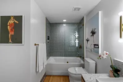 a bathroom with a tub and a toilet and a sink at 37th Floor - 1bdrm Unt amazing View at Downtown Miami in Miami