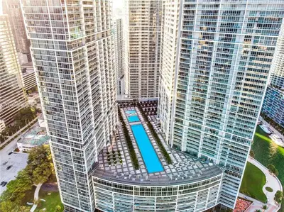an overhead view of a large building with a pool in it at Sky High Penthouse Corner 2BR 2BA Icon Brickell in Miami