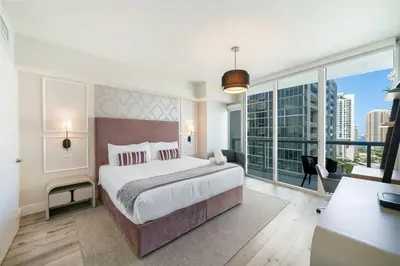 a bedroom with a large bed and a large window at Incredible Ocean View 1BR 1BA Icon Brickell in Miami