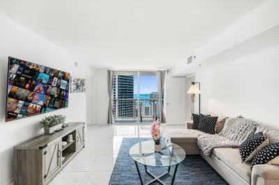a living room with a couch and a table at Exclusivity & Relaxation Offered By Our Condo in Miami