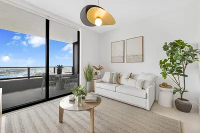 a living room with a white couch and a large window at On 44th Floor! Condo w The Best Views & Free Parking in Miami