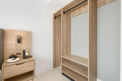 a dressing room with a sliding glass door at On 44th Floor! Condo w The Best Views & Free Parking in Miami