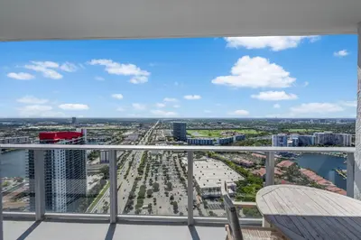 a view of a city from the balcony of a building at Stunning High-Floor City View 1BR Hyde Beach House in Hollywood