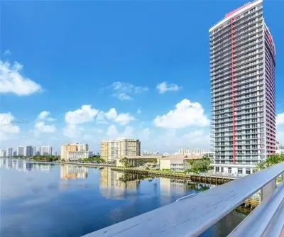 a view of a city with a river and buildings at 2 Bed 2 Bath Penthouse Amazing Views Beach Service in Hallandale Beach