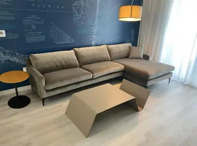 a living room with a couch and a table at 2 Bed 2 Bath Full Equiped Beachwalk Pool Gym 22 in Hallandale Beach