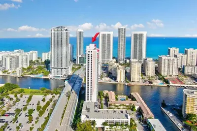 an aerial view of a city with the ocean at 2 Bed & 2 Bath at Beachwalk Pool Gym Beach on 19th in Hallandale Beach