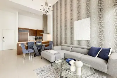 a living room with a couch and a table at High Ceiling Exquisite 1BR 1BA ICON Brickell in Miami