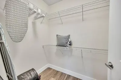 a room with a shelf with a pillow on it at Trendy One Bedroom Getaway Steps from Biscayne in Miami