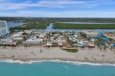 an aerial view of a resort on a beach at Seaside Beach House in Hollywood