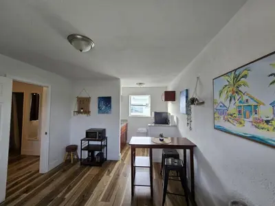 a room with a desk and a room with a hallway at Cozy Place Near Design District - 4 in Miami