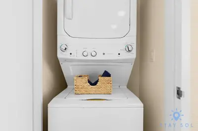 a washing machine with a basket on top of it at Unique Apartment Miami Views in Sunny Isles Beach