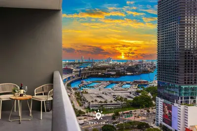a view of a city from the balcony of a building at 1BR Apartment - Pool & Gym in Miami
