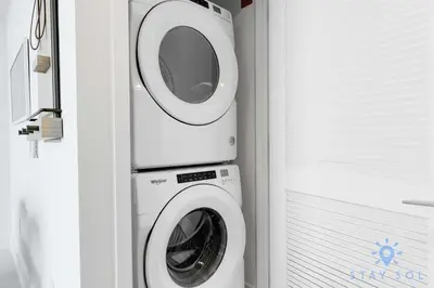 a washing machine and a dryer in a room at 1 BR - City Views Gym & Pool in Miami