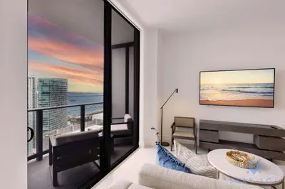 a living room with a view of the ocean at Best Stay - City Views Gym & Pool in Miami