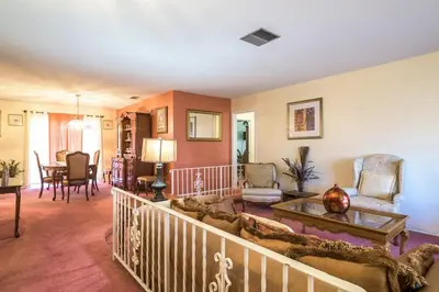 a living room with a couch and a table at Oasis1080 Resort in Plantation