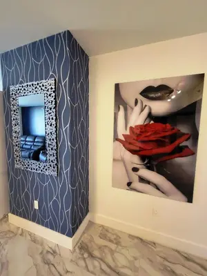 a mirror on a wall in a room at Luxury Apt with Ocean View in Hallandale in Hallandale Beach