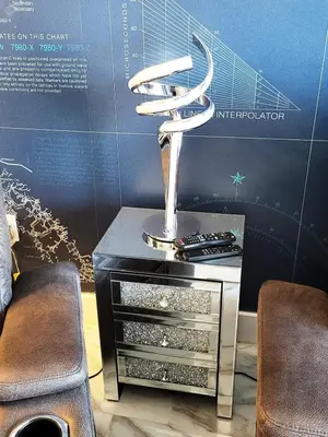 a stand with a phone on it next to two chairs at The Royal Suite of Beachwalk 2b 2b Apmt in Hallandale Beach